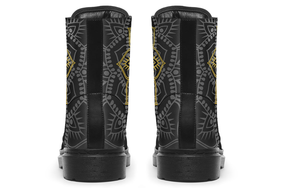 Black boots with a gold/yellow mandala design.