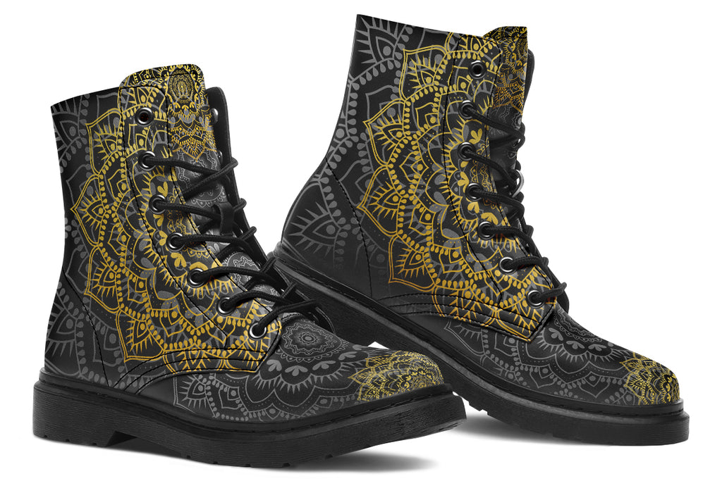 Black boots with a gold/yellow mandala design.