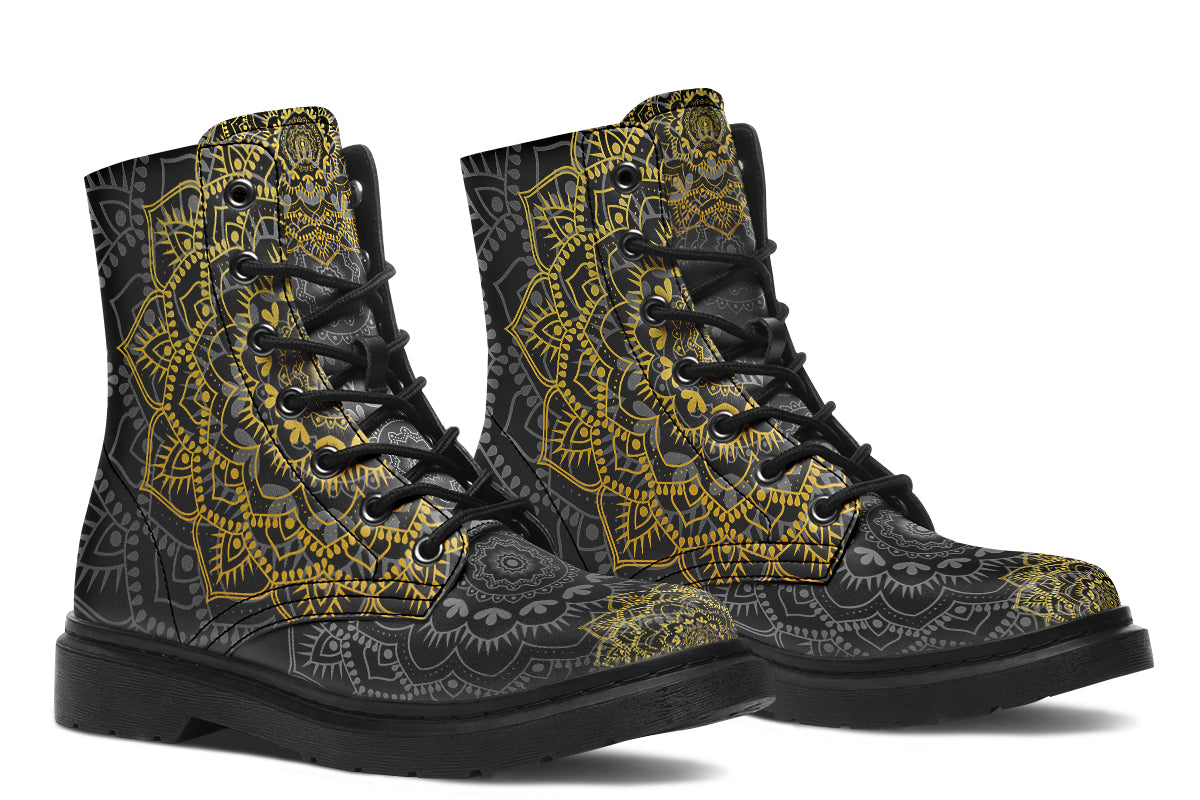Black boots with a gold/yellow mandala design.