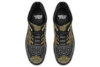 Black boots with a gold/yellow mandala design.