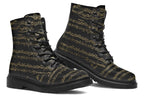 Black boots with a black sole, featuring yellowish/gold sheet music design.