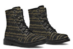 Black boots with a black sole, featuring yellowish/gold sheet music design.