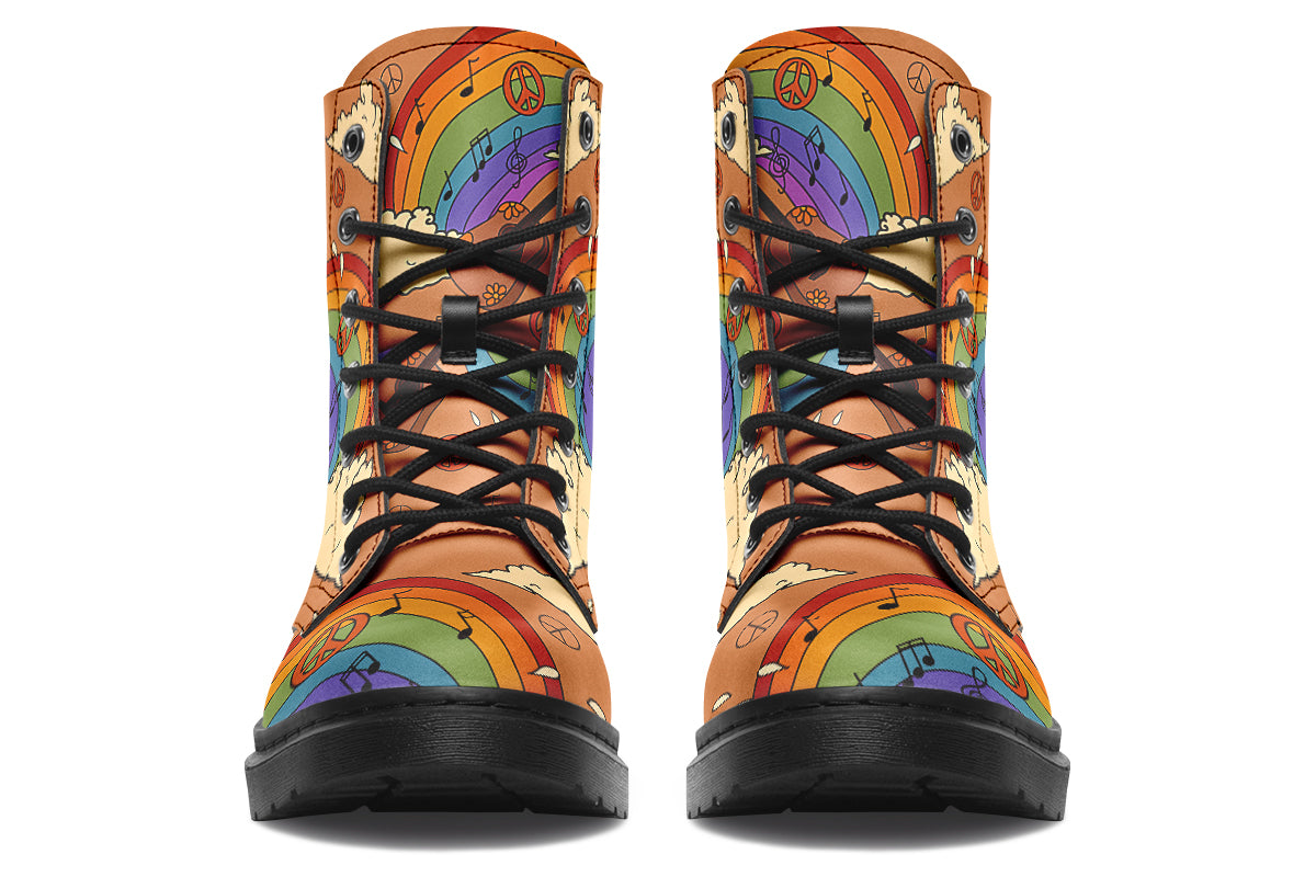 Brown boots with a retro-style design of guitars, clouds, rainbows, peace signs and music notes.