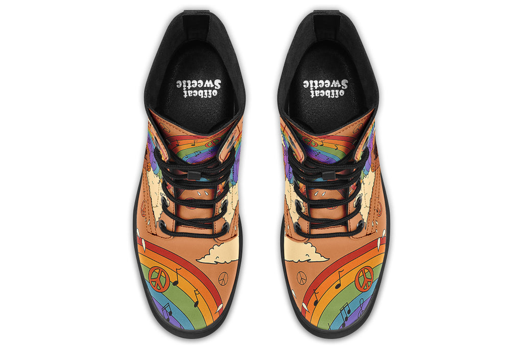 Brown boots with a retro-style design of guitars, clouds, rainbows, peace signs and music notes.