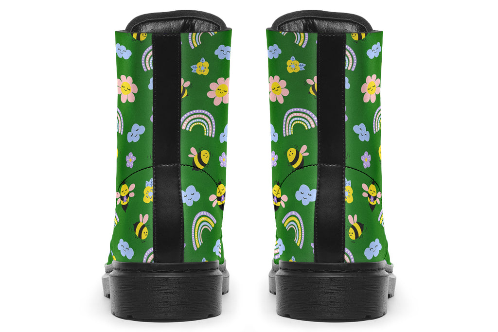 Cute bees and rainbows design on a green background.