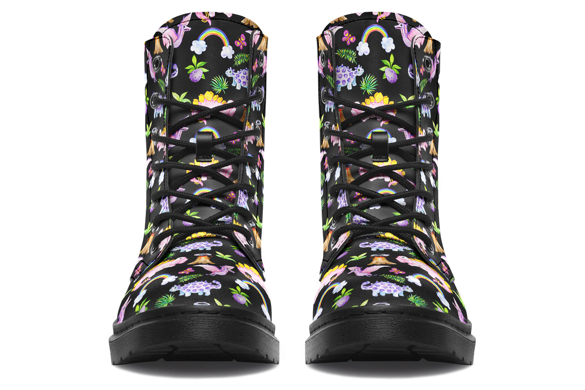 Black boots featuring a patterns of pink and purple dinosaurs, rainbows and plants.