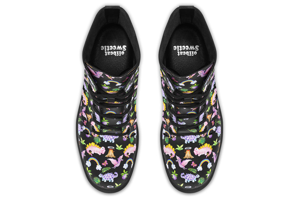 Black boots featuring a patterns of pink and purple dinosaurs, rainbows and plants.