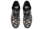 Black boots featuring a patterns of pink and purple dinosaurs, rainbows and plants.