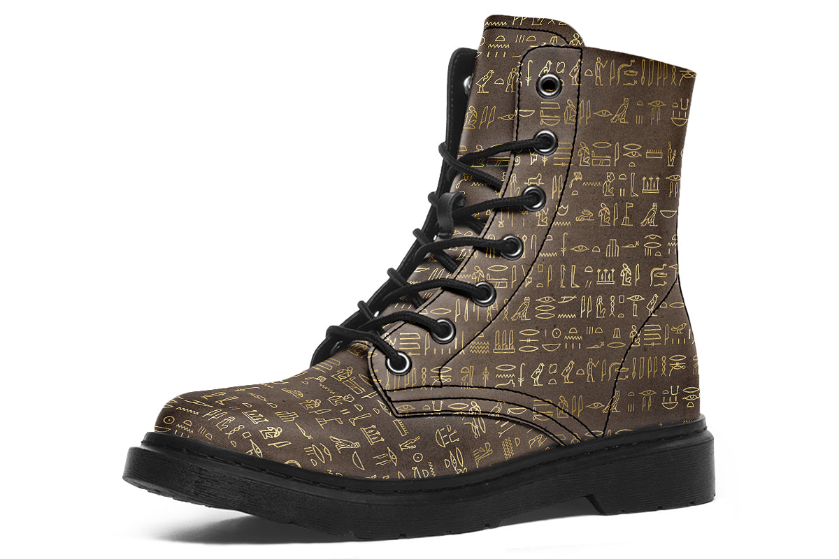Dark brown boots with a gold hieroglyphics pattern