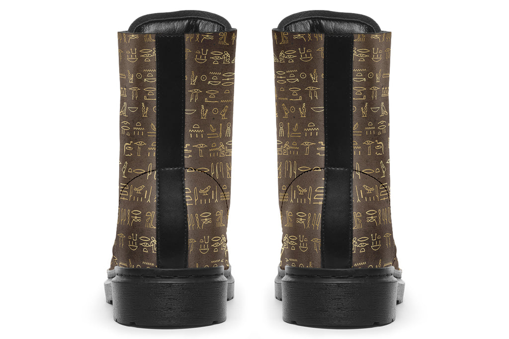Dark brown boots with a gold hieroglyphics pattern