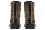 Dark brown boots with a gold hieroglyphics pattern