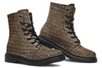 Dark brown boots with a gold hieroglyphics pattern