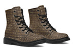 Dark brown boots with a gold hieroglyphics pattern