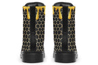 Black boots with a yellow honeycomb pattern, with the image of dripping honey on the top of the boots as if the honey is dripping down the boots