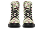 Cream-coloured boots with a pattern of dark green hummingbirds, pink flowers and green leaves