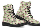 Cream-coloured boots with a pattern of dark green hummingbirds, pink flowers and green leaves