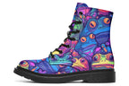 Boots featuring a busy pattern of psychedelic-looking frogs in hues of blues, purples, greens and yellows.