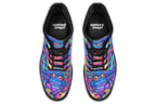 Boots featuring a busy pattern of psychedelic-looking frogs in hues of blues, purples, greens and yellows.