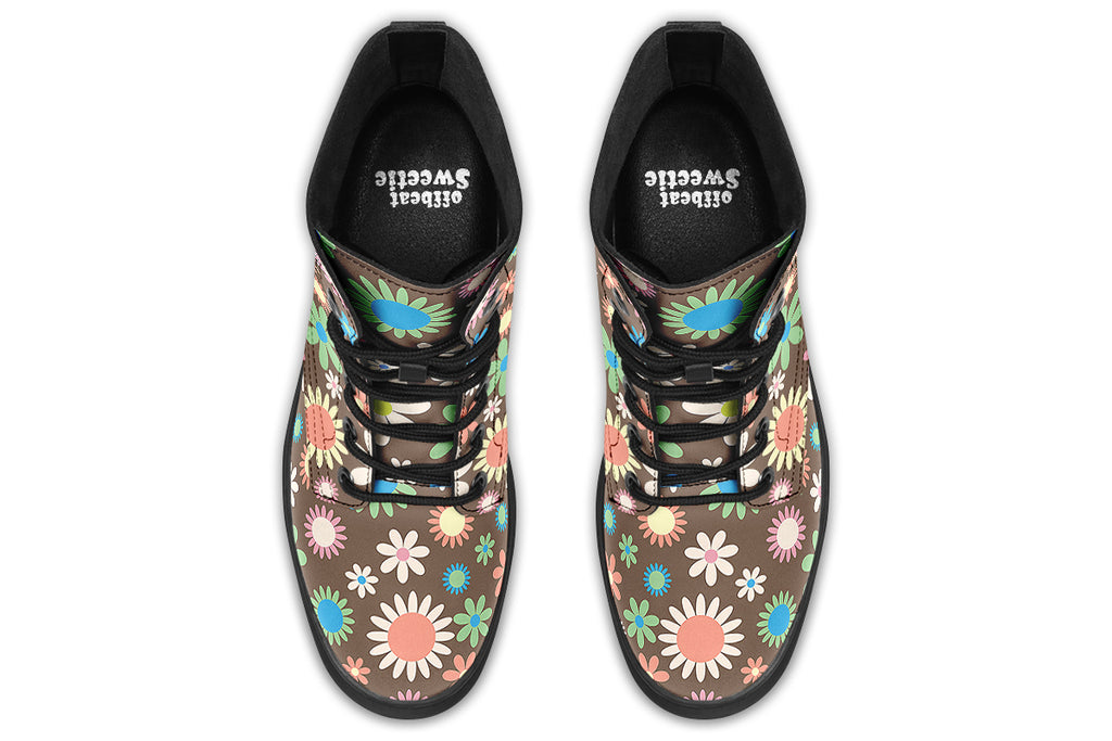 Brown boots with retro floral pattern on them