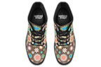Brown boots with retro floral pattern on them