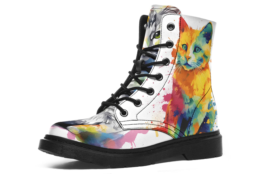 White boots, each with a different cat image, with watercolour splashes of colour coming out from behind them