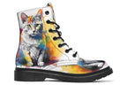 White boots, each with a different cat image, with watercolour splashes of colour coming out from behind them