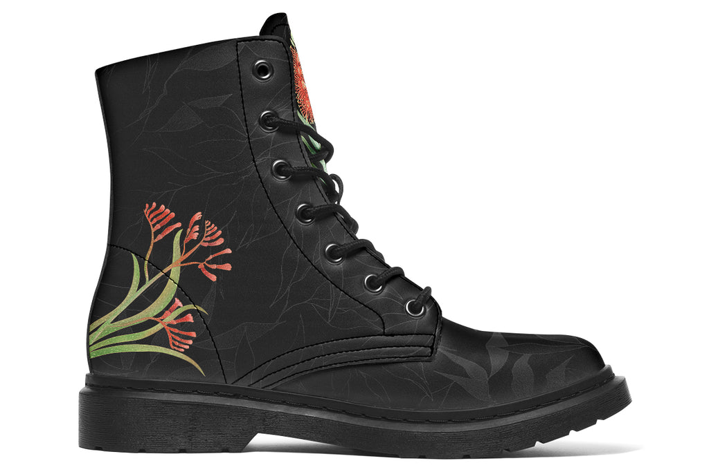 Black boots featuring an image of a king parrot with Australian flora