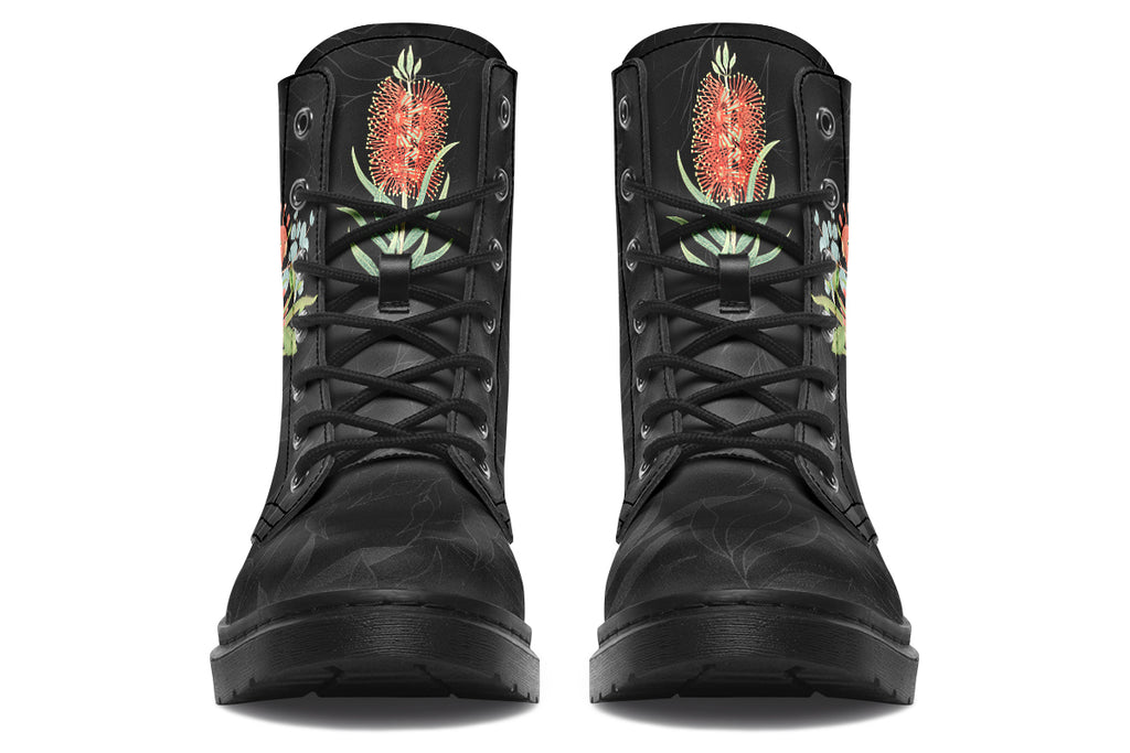 Black boots featuring an image of a king parrot with Australian flora