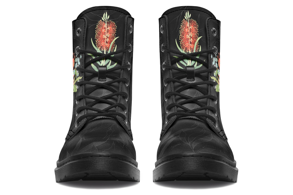 Black boots featuring an image of a king parrot with Australian flora