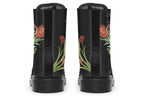 Black boots featuring an image of a king parrot with Australian flora