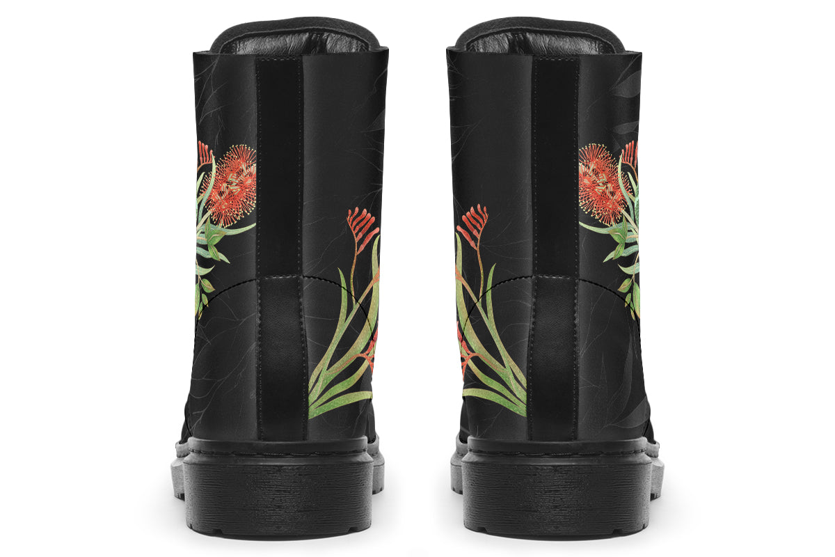 Black boots featuring an image of a king parrot with Australian flora
