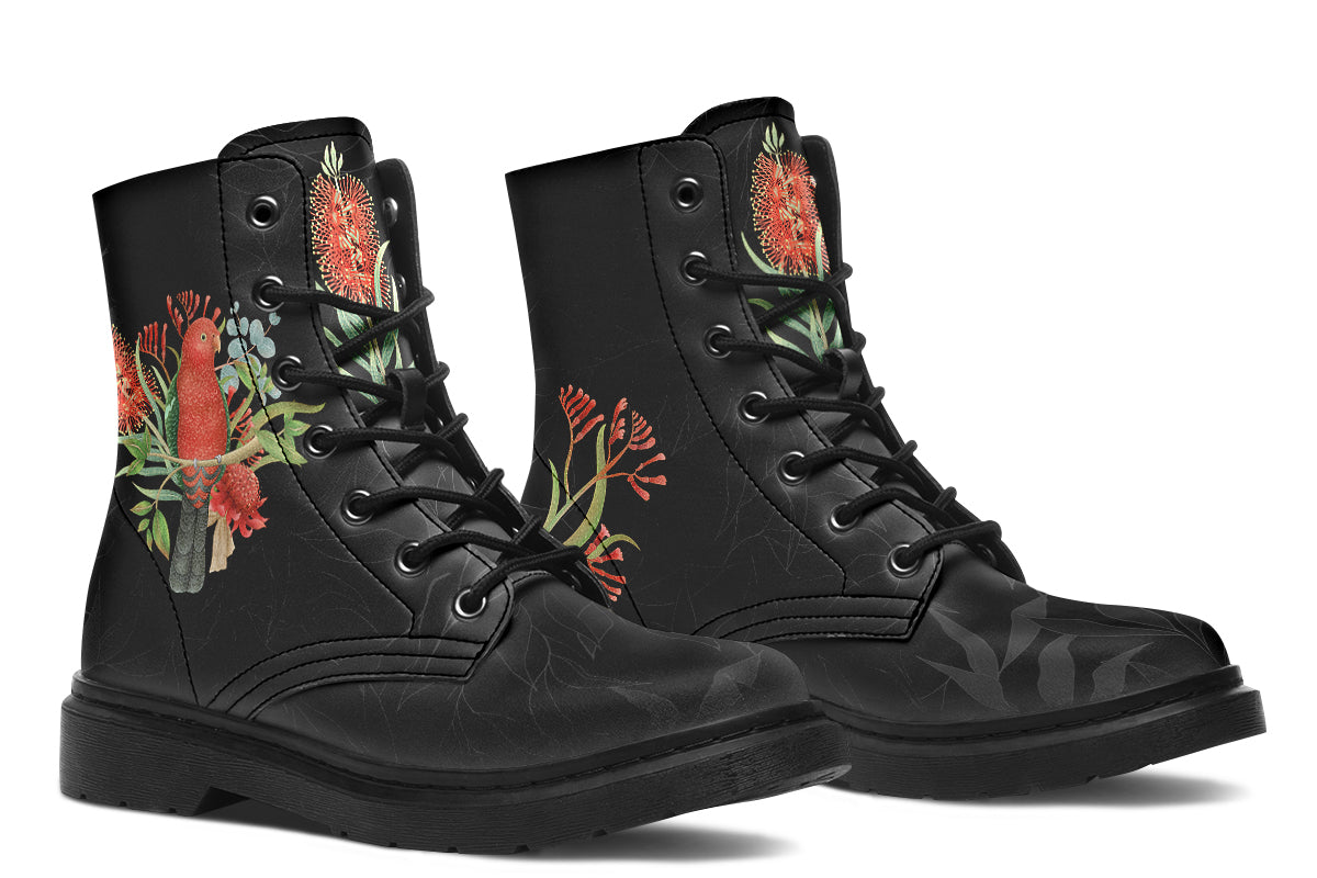 Black boots featuring an image of a king parrot with Australian flora