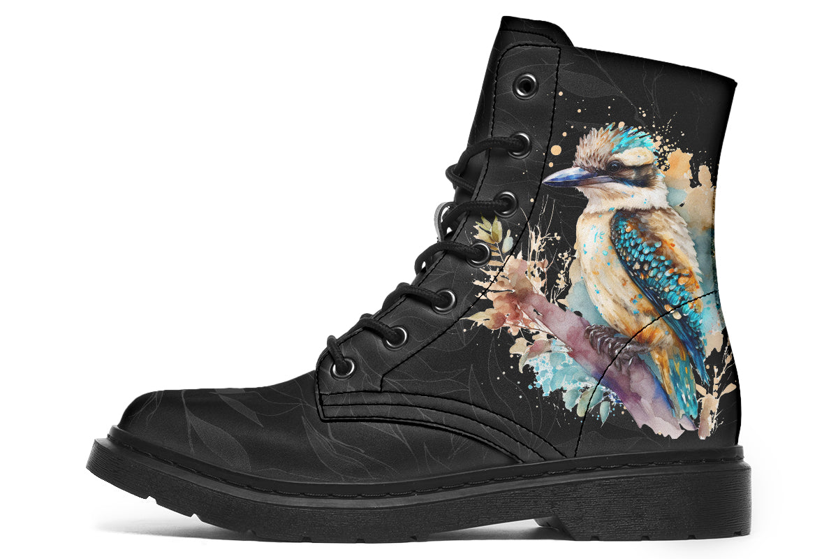 Boots featuring a subtle black leave patterned background, with a watercolour-style image of a kookaburra on the outsides of the boots, and purple and red wattle on the inside panels. 