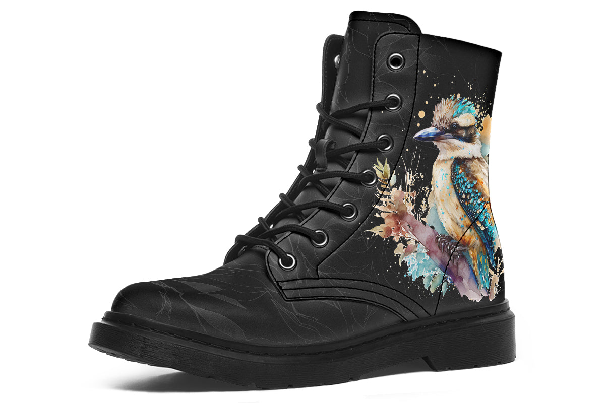 Boots featuring a subtle black leave patterned background, with a watercolour-style image of a kookaburra on the outsides of the boots, and purple and red wattle on the inside panels. 
