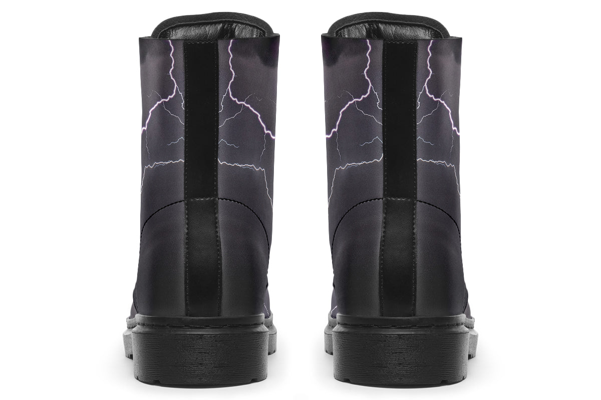 Black boots with images of lightning on them