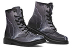 Black boots with images of lightning on them