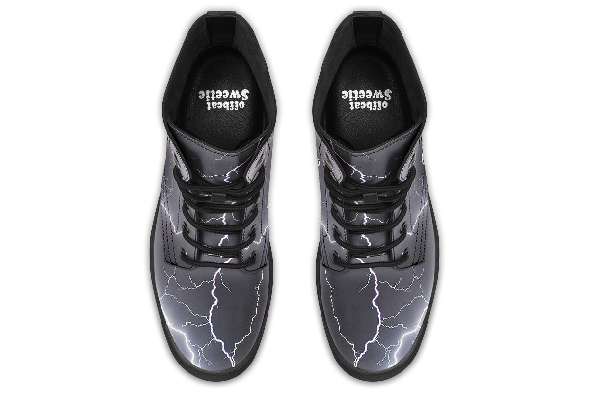 Black boots with images of lightning on them