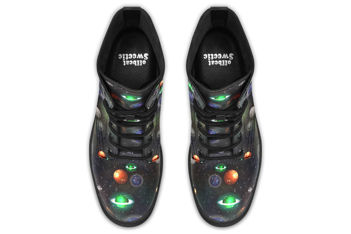 Black boots with planet design