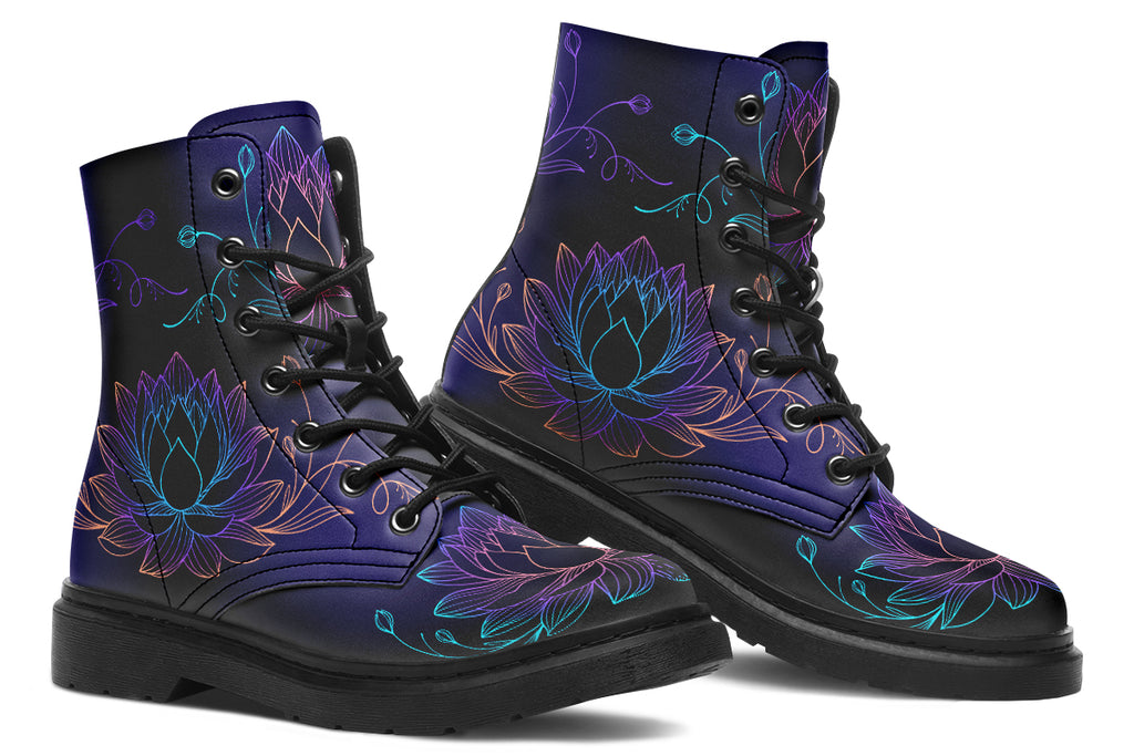 Boots with a black and dark purple gradient background and lotus flowers with a gradient that goes form blue, to purple, to pink, to orange.