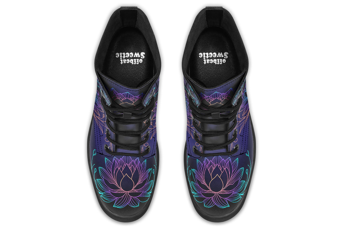 Boots with a black and dark purple gradient background and lotus flowers with a gradient that goes form blue, to purple, to pink, to orange.