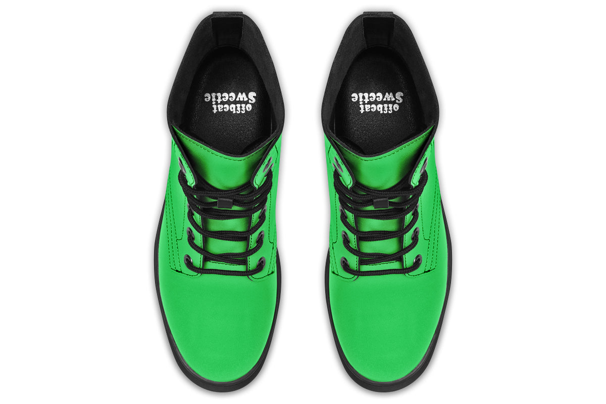 Vibrant green boots with a black sole.