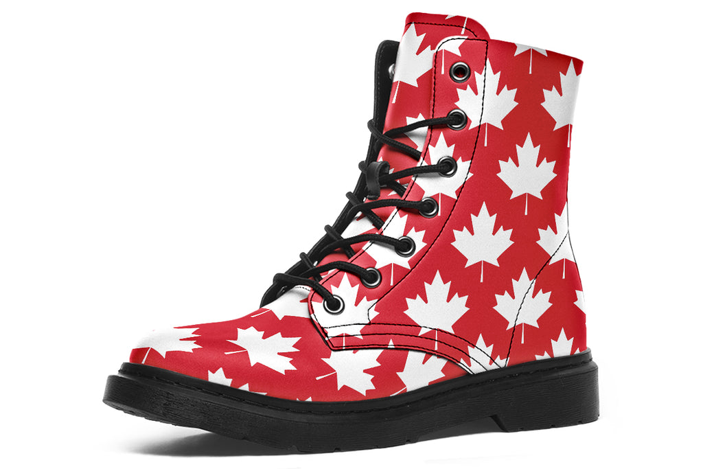 Red boots with white maple leaf patterns all over them