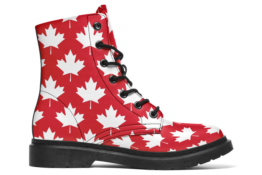 Red boots with white maple leaf patterns all over them