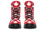 Red boots with white maple leaf patterns all over them