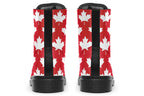 Red boots with white maple leaf patterns all over them