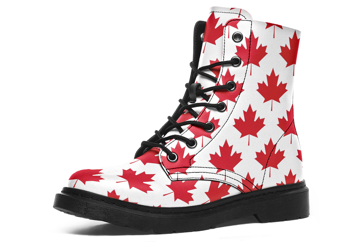 White boots with red maple leaf patterns all over it