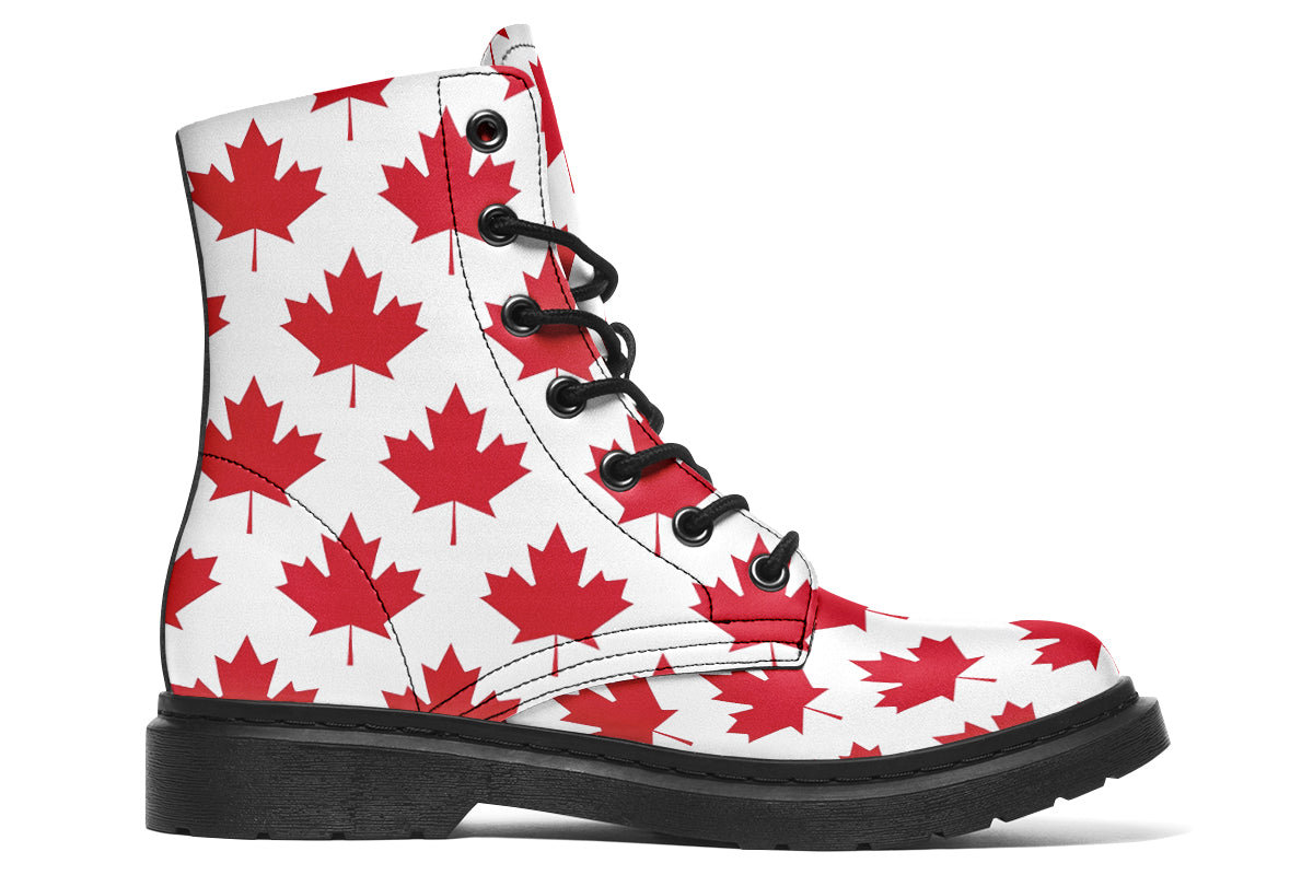 White boots with red maple leaf patterns all over it