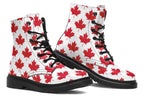 White boots with red maple leaf patterns all over it