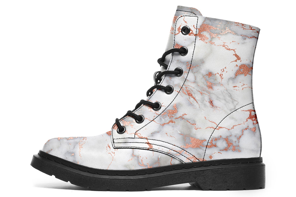 Boots featuring a grey marble-like pattern with accents of blush pink throughout the marble design