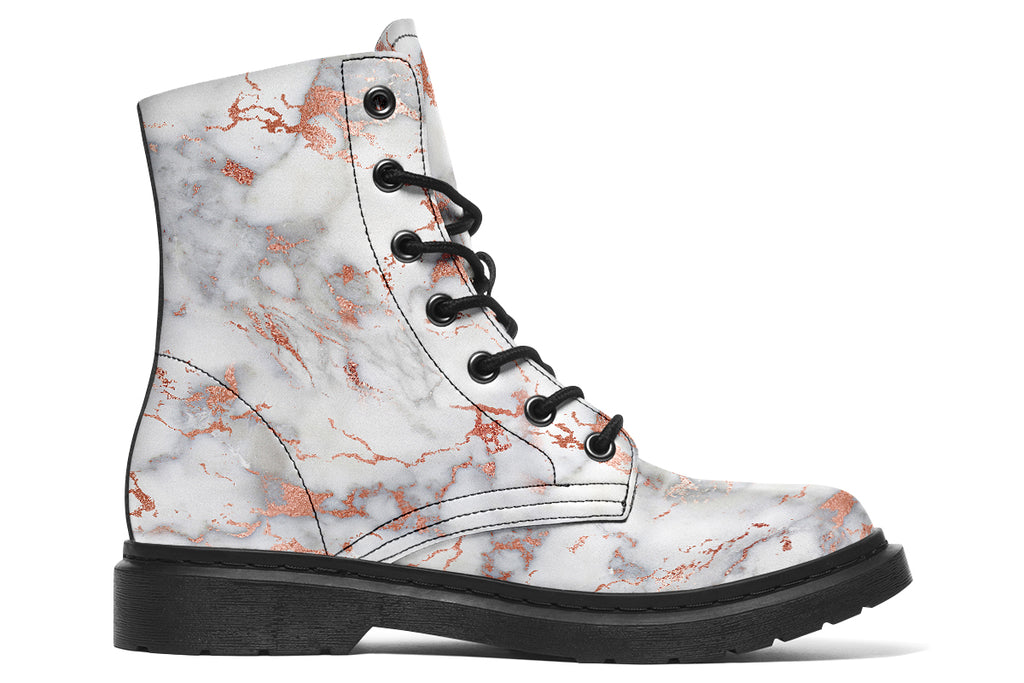 Boots featuring a grey marble-like pattern with accents of blush pink throughout the marble design